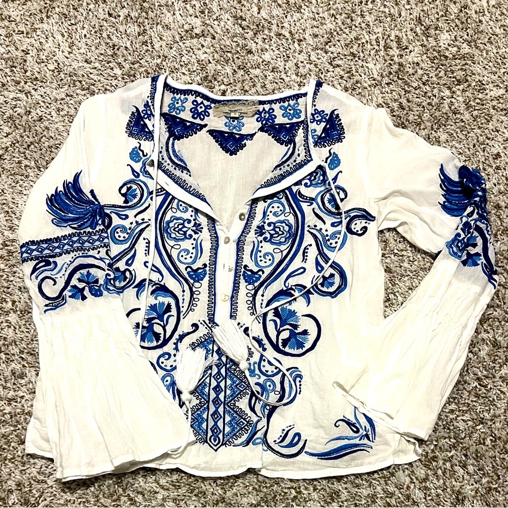 Light cotton embroidered top with bell sleeves